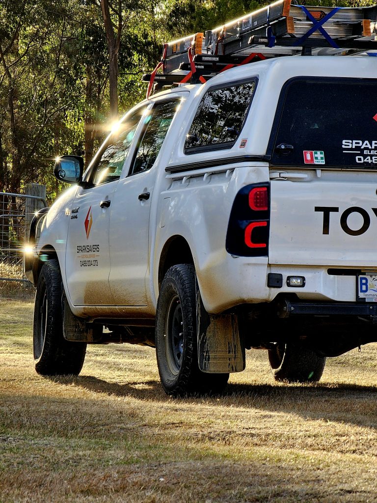 Work vehicle of professional Hobart electricians, stocked with tools and equipment for electrical and solar installations.